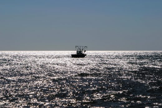Hintergrundbild Fischerboot am Morgen