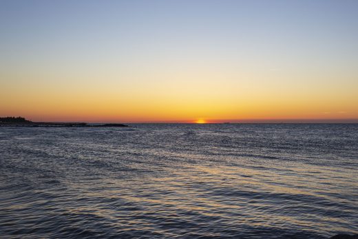 Hintergrundbild Ostsee mit Sonnenuntergang