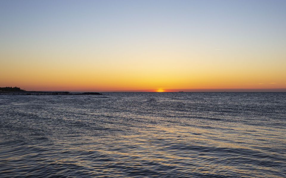 Hintergrundbild Ostsee mit Sonnenuntergang