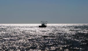 Hintergrundbild Fischerboot am Morgen