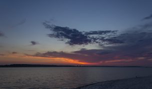 Hintergrundbild - Abendstimmung über der Förde