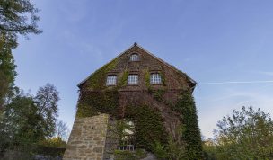 Hintergrundbild - Tüshaus Mühle in Deuten