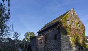 Hintergrundbild - Die Tüshaus Mühle